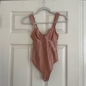 Urban Outfitters pink bodysuit